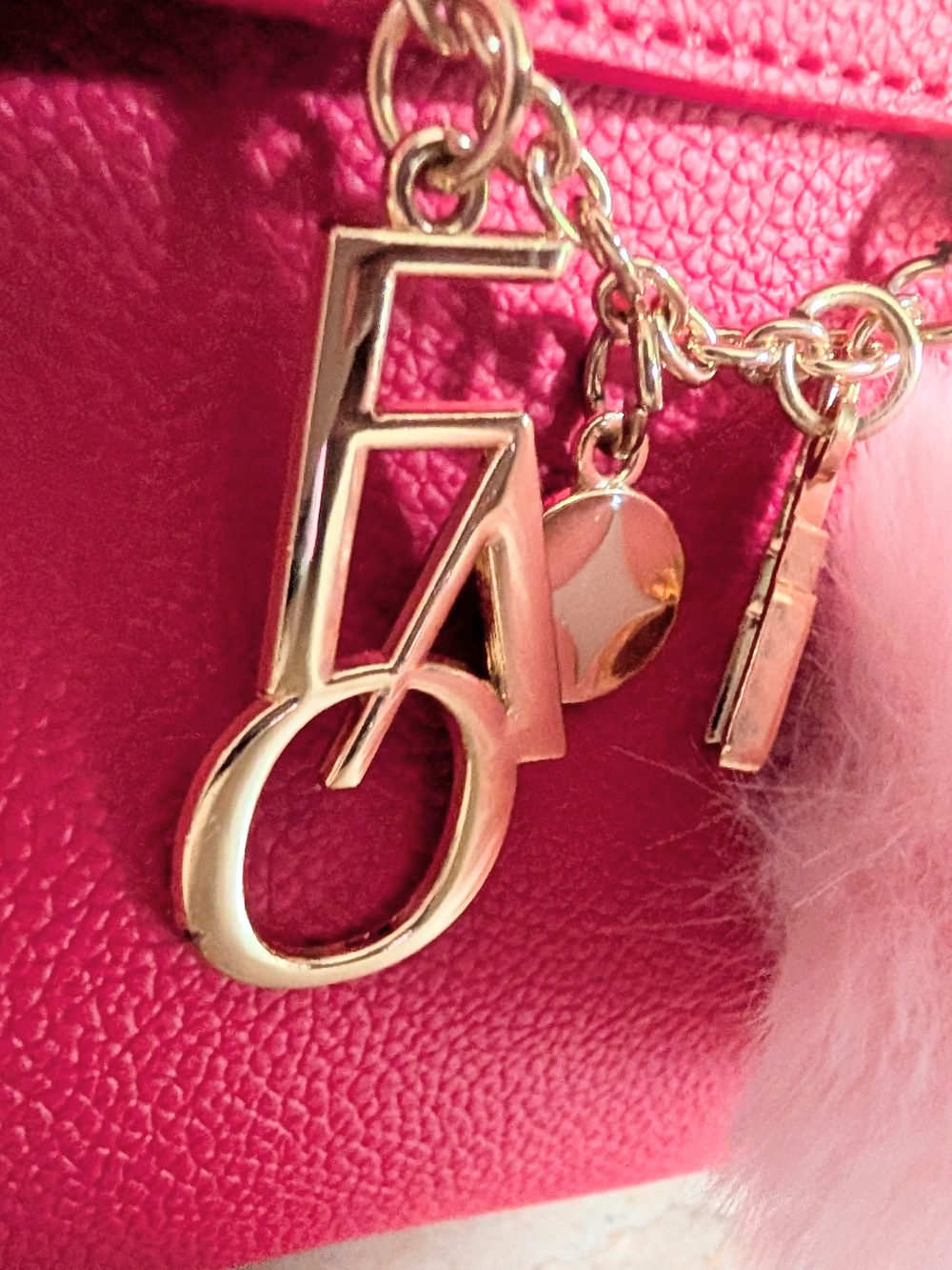 FAO Schwarz Hudson Hot Pink Mini Tote Bag with Pom Charm - Picture 4 of 11
